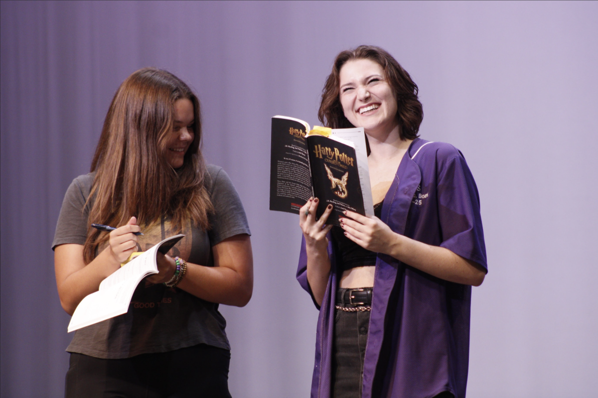 Senior Caroline Quanstrom rehearses with another cast member for the upcoming play. 